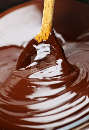 To use this stock image in your creative project, please select the size you need over to the right and click the "Add to Cart" button.
Your downloaded image will come with the Cutcaster watermark removed so don’t worry about the watermark you see on this page. Melted chocolate and spoon stock photo, Wooden spoon stirring soft melted rich chocolate by Elena Elisseeva
