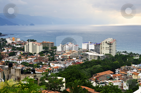 To use this stock image in your creative project, please select the size you need over to the right and click the "Add to Cart" button.
Your downloaded image will come with the Cutcaster watermark removed so don’t worry about the watermark you see on this page. Cityscape in Puerto Vallarta, Mexico stock photo, Cityscape view from above with Pacific ocean in Puerto Vallarta, Mexico by Elena Elisseeva