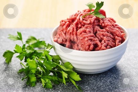 To use this stock image in your creative project, please select the size you need over to the right and click the "Add to Cart" button.
Your downloaded image will come with the Cutcaster watermark removed so don’t worry about the watermark you see on this page. Bowl of raw ground meat stock photo, Close up on bowl of lean red raw ground meat by Elena Elisseeva