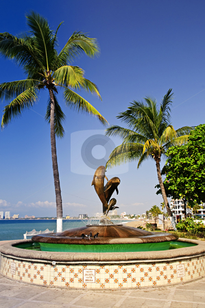 To use this stock image in your creative project, please select the size you need over to the right and click the "Add to Cart" button.
Your downloaded image will come with the Cutcaster watermark removed so don’t worry about the watermark you see on this page. Friendship fountain in Puerto Vallarta, Mexico stock photo, Friendship fountain on Malecon at Pacific ocean in Puerto Vallarta, Mexico by Elena Elisseeva