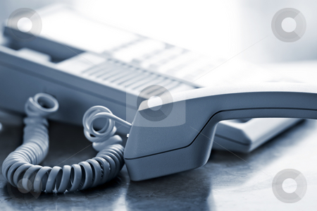 To use this stock image in your creative project, please select the size you need over to the right and click the "Add to Cart" button.
Your downloaded image will come with the Cutcaster watermark removed so don’t worry about the watermark you see on this page. Desk telephone off hook stock photo, Telephone handset off the hook on desk by Elena Elisseeva