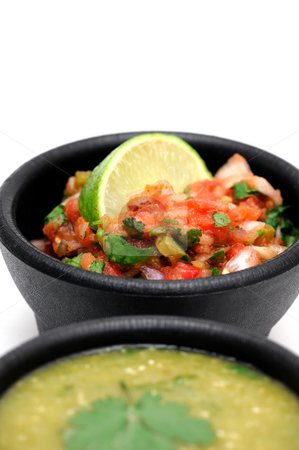 To use this stock image in your creative project, please select the size you need over to the right and click the "Add to Cart" button.
Your downloaded image will come with the Cutcaster watermark removed so don’t worry about the watermark you see on this page. Mexican Salsa stock photo, Bowls of spicy homemade salsa topped with fresh lime both tomato and salsa verde are included by Lynn Bendickson