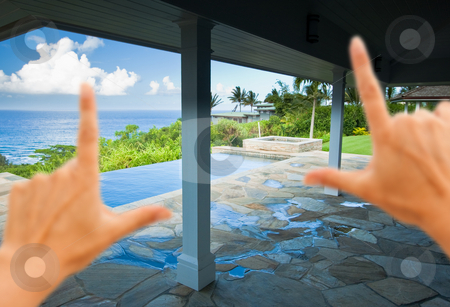 To use this stock image in your creative project, please select the size you need over to the right and click the "Add to Cart" button.
Your downloaded image will come with the Cutcaster watermark removed so don’t worry about the watermark you see on this page. Hands Framing Breathtaking Hawaiian Ocean View Deck stock photo, Hands Framing Breathtaking Hawaiian Ocean View Deck and Pool with Deep Blue Sky by Andy Dean
