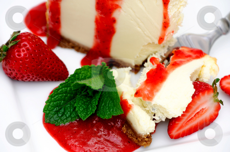 To use this stock image in your creative project, please select the size you need over to the right and click the "Add to Cart" button.
Your downloaded image will come with the Cutcaster watermark removed so don’t worry about the watermark you see on this page. Cheesecake With Strawberry stock photo, Slice of cheesecake with fresh strawberries and and a bright red strawberry sauce dripping over the sides on the dessert. by Lynn Bendickson