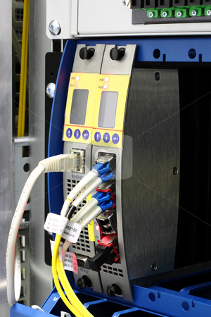 To use this stock image in your creative project, please select the size you need over to the right and click the "Add to Cart" button.
Your downloaded image will come with the Cutcaster watermark removed so don’t worry about the watermark you see on this page. Fiber optic wdm multiplexer with lc connector stock photo, LightGAIN fiber optic wdm multiplexer mounted in rack with lc connector by Artush
