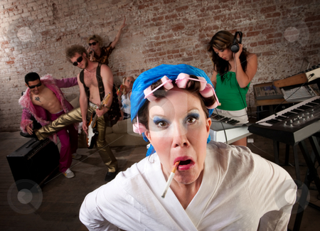 To use this stock image in your creative project, please select the size you need over to the right and click the "Add to Cart" button.
Your downloaded image will come with the Cutcaster watermark removed so don’t worry about the watermark you see on this page. Angry neighbor stock photo, Angry neighbor crashing a 1970s Disco Music Party by Scott Griessel