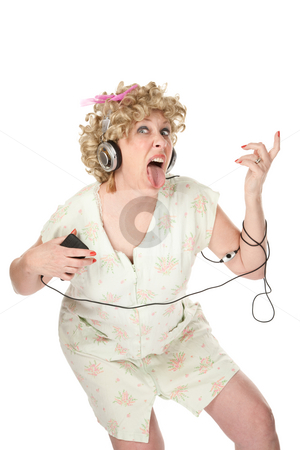 To use this stock image in your creative project, please select the size you need over to the right and click the "Add to Cart" button.
Your downloaded image will come with the Cutcaster watermark removed so don’t worry about the watermark you see on this page. Funny woman in nightgown listening to music stock photo, Funny woman in nightgown listening to music and dancing by Scott Griessel