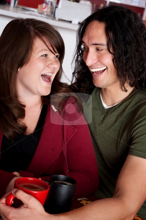 To use this stock image in your creative project, please select the size you need over to the right and click the "Add to Cart" button.
Your downloaded image will come with the Cutcaster watermark removed so don’t worry about the watermark you see on this page. Couple in coffee house stock photo, Interracial couple together at a coffee house by Scott Griessel