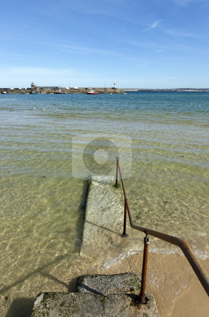 To use this stock image in your creative project, please select the size you need over to the right and click the "Add to Cart" button.
Your downloaded image will come with the Cutcaster watermark removed so don’t worry about the watermark you see on this page. St. Ives clear sea water covering the harbour beach. stock photo, St. Ives clear sea water covering the harbour beach. by Stephen Rees