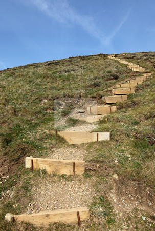 To use this stock image in your creative project, please select the size you need over to the right and click the "Add to Cart" button.
Your downloaded image will come with the Cutcaster watermark removed so don’t worry about the watermark you see on this page. Steps to the top of a hill on the Cornish coast path. stock photo, Steps to the top of a hill on the Cornish coast path. by Stephen Rees
