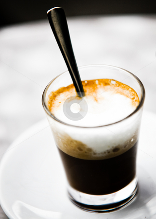 To use this stock image in your creative project, please select the size you need over to the right and click the "Add to Cart" button.
Your downloaded image will come with the Cutcaster watermark removed so don’t worry about the watermark you see on this page. Cappuccino Foam Glass stock photo, Tasty Glass Of Cappuccino With Cream And Foam by Nick Fingerhut