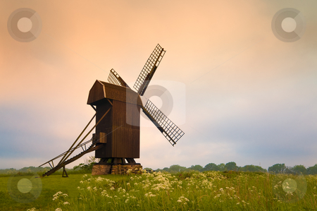 To use this stock image in your creative project, please select the size you need over to the right and click the "Add to Cart" button.
Your downloaded image will come with the Cutcaster watermark removed so don’t worry about the watermark you see on this page. Old wooden windmill stock photo, Old wooden windmill in South Sweden in the light of the early morning. by Kai Schirmer