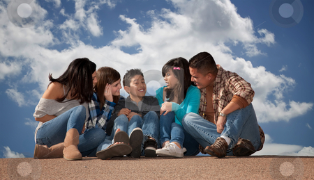 To use this stock image in your creative project, please select the size you need over to the right and click the "Add to Cart" button.
Your downloaded image will come with the Cutcaster watermark removed so don’t worry about the watermark you see on this page. Hispanic Family Looking at Young Son stock photo, Hispanic family seated against a cloudy sky by Scott Griessel