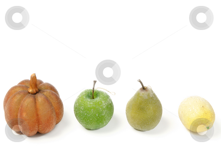 To use this stock image in your creative project, please select the size you need over to the right and click the "Add to Cart" button.
Your downloaded image will come with the Cutcaster watermark removed so don’t worry about the watermark you see on this page. Artificial Fruit stock photo, A row of artificial fruit, pumkin, apple, pear, and lemon, isolated against a white background with copyspace on top by Richard Nelson