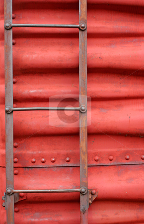 To use this stock image in your creative project, please select the size you need over to the right and click the "Add to Cart" button.
Your downloaded image will come with the Cutcaster watermark removed so don’t worry about the watermark you see on this page. Ladder on the side of a train boxcar stock photo, A Ladder on the side of a train boxcar by Jim Mills