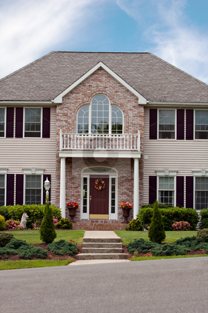 To use this stock image in your creative project, please select the size you need over to the right and click the "Add to Cart" button.
Your downloaded image will come with the Cutcaster watermark removed so don’t worry about the watermark you see on this page. Custom Built Home stock photo, A large custom built luxury home in a residential neighborhood. This high end house is very nicely landscaped property. by Todd Arena