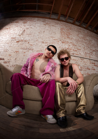 To use this stock image in your creative project, please select the size you need over to the right and click the "Add to Cart" button.
Your downloaded image will come with the Cutcaster watermark removed so don’t worry about the watermark you see on this page. Chill stock photo, Two cool party goers sitting on a sofa by Scott Griessel