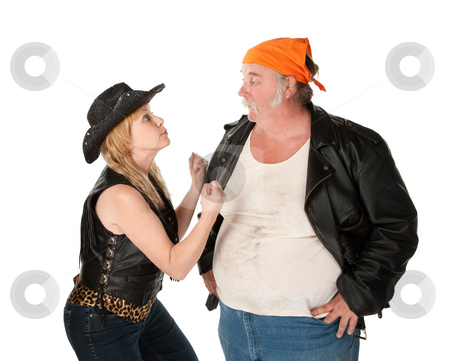 To use this stock image in your creative project, please select the size you need over to the right and click the "Add to Cart" button.
Your downloaded image will come with the Cutcaster watermark removed so don’t worry about the watermark you see on this page. Serious argument stock photo, Biker couple engaged in a serious argument by Scott Griessel
