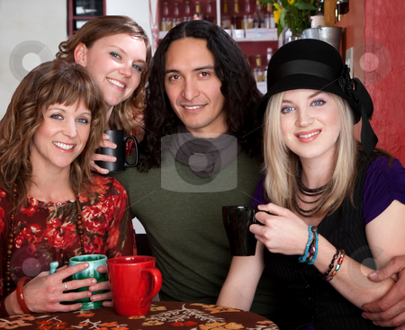 To use this stock image in your creative project, please select the size you need over to the right and click the "Add to Cart" button.
Your downloaded image will come with the Cutcaster watermark removed so don’t worry about the watermark you see on this page. Four friends stock photo, Four friends smiling and enjoying drinks at a cafe by Scott Griessel