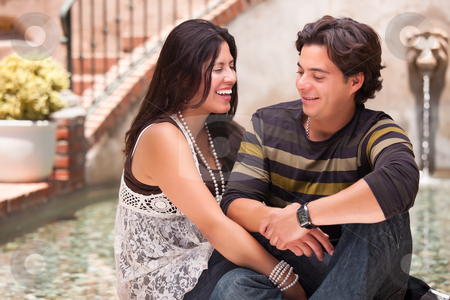 To use this stock image in your creative project, please select the size you need over to the right and click the "Add to Cart" button.
Your downloaded image will come with the Cutcaster watermark removed so don’t worry about the watermark you see on this page. Attractive Hispanic Couple At A Fountain stock photo, Attractive Hispanic Couple Ejoying Each Other At A Fountain. by Andy Dean