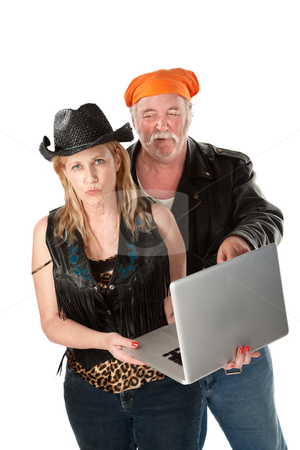 To use this stock image in your creative project, please select the size you need over to the right and click the "Add to Cart" button.
Your downloaded image will come with the Cutcaster watermark removed so don’t worry about the watermark you see on this page. Embarrasing Internet Content stock photo, Man laughing at embarrasing content on the Internet by Scott Griessel
