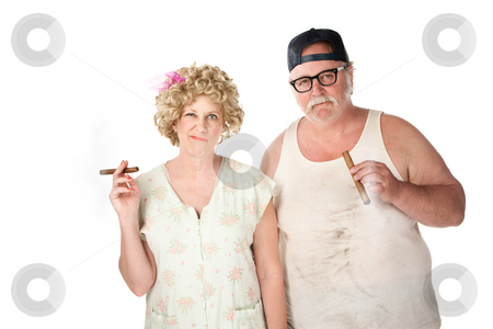 To use this stock image in your creative project, please select the size you need over to the right and click the "Add to Cart" button.
Your downloaded image will come with the Cutcaster watermark removed so don’t worry about the watermark you see on this page. Cigar couple stock photo, Smirking homely couple with cigars on white background by Scott Griessel