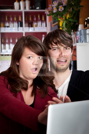 To use this stock image in your creative project, please select the size you need over to the right and click the "Add to Cart" button.
Your downloaded image will come with the Cutcaster watermark removed so don’t worry about the watermark you see on this page. Caught stock photo, Caught viewing something naughty on a laptop in a cafe by Scott Griessel
