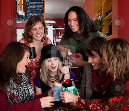 To use this stock image in your creative project, please select the size you need over to the right and click the "Add to Cart" button.
Your downloaded image will come with the Cutcaster watermark removed so don’t worry about the watermark you see on this page. Toast stock photo, Six friends making a toast around a table by Scott Griessel