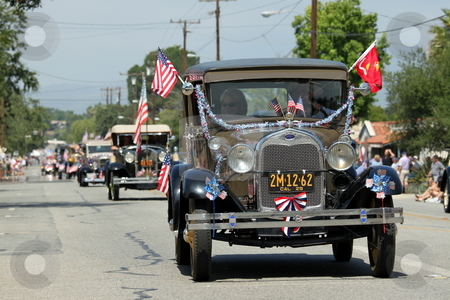 To use this stock image in your creative project, please select the size you need over to the right and click the "Add to Cart" button.
Your downloaded image will come with the Cutcaster watermark removed so don’t worry about the watermark you see on this page. Ojai 4th of July Parade 2010 stock photo, Ojai, CA - JULY 3 : Annual 4th of July parade in Ojai one day early this year July 3, 2010 in Ojai, CA. by Henrik Lehnerer