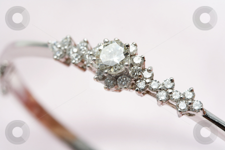 To use this stock image in your creative project, please select the size you need over to the right and click the "Add to Cart" button.
Your downloaded image will come with the Cutcaster watermark removed so don’t worry about the watermark you see on this page. Diamond jewelry stock photo, A close up shot of a diamond jewelry by Suprijono Suharjoto
