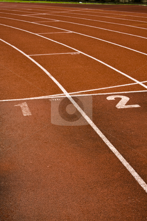 To use this stock image in your creative project, please select the size you need over to the right and click the "Add to Cart" button.
Your downloaded image will come with the Cutcaster watermark removed so don’t worry about the watermark you see on this page. Running lanes on a track in play gorund stock photo, Running lanes on a track in play gorund by Keng po Leung