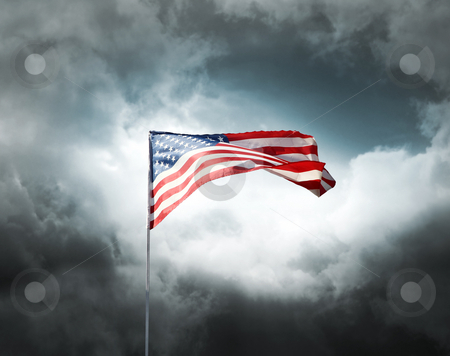 To use this stock image in your creative project, please select the size you need over to the right and click the "Add to Cart" button.
Your downloaded image will come with the Cutcaster watermark removed so don’t worry about the watermark you see on this page. American flag on a cloudy dramatic sky stock photo, American flag on a dark cloudy dramatic sky by Laurent Davoust