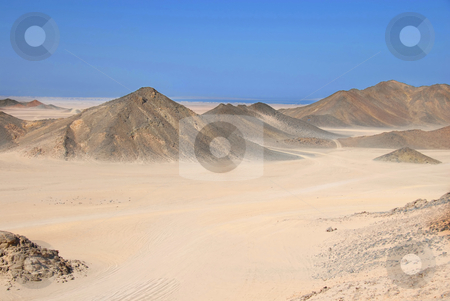 To use this stock image in your creative project, please select the size you need over to the right and click the "Add to Cart" button.
Your downloaded image will come with the Cutcaster watermark removed so don’t worry about the watermark you see on this page. Egypt desert stock photo, Sahara dry desert view by Hurghada, Egypt, hills and sand by Julija Sapic