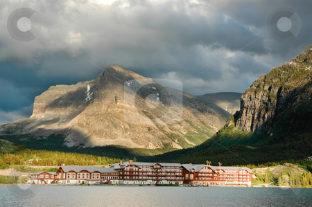 To use this stock image in your creative project, please select the size you need over to the right and click the "Add to Cart" button.
Your downloaded image will come with the Cutcaster watermark removed so don’t worry about the watermark you see on this page. Many Glacier Hotel stock photo, Historic Many Glacier Hotel at Glacier National Park by Don Fink