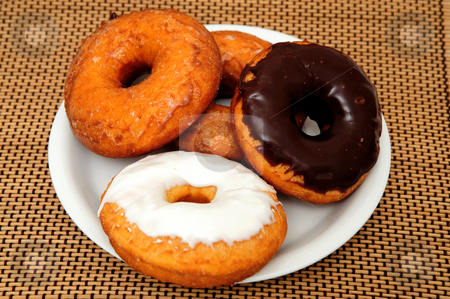 To use this stock image in your creative project, please select the size you need over to the right and click the "Add to Cart" button.
Your downloaded image will come with the Cutcaster watermark removed so don’t worry about the watermark you see on this page. Doughnuts stock photo, Sweet Donuts on a saucer ready for breakfast or a snack by Lynn Bendickson
