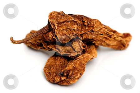 To use this stock image in your creative project, please select the size you need over to the right and click the "Add to Cart" button.
Your downloaded image will come with the Cutcaster watermark removed so don’t worry about the watermark you see on this page. Smoke-Dried Chipotle stock photo, Mexican chipotle chilies smoke dried used to make salsa and meat marinades by Lynn Bendickson