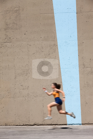 To use this stock image in your creative project, please select the size you need over to the right and click the "Add to Cart" button.
Your downloaded image will come with the Cutcaster watermark removed so don’t worry about the watermark you see on this page. Muscular woman sprints to win stock photo, Woman sprinter practices her dash to the finish line. by Scott Griessel