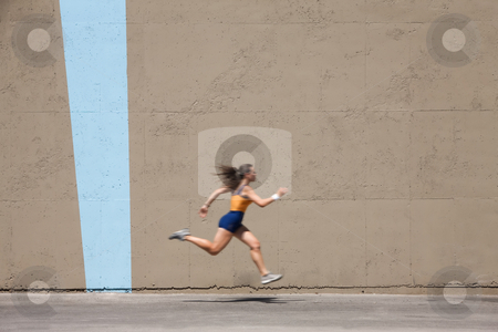 To use this stock image in your creative project, please select the size you need over to the right and click the "Add to Cart" button.
Your downloaded image will come with the Cutcaster watermark removed so don’t worry about the watermark you see on this page. Muscular woman sprints to win stock photo, Woman sprinter practices her dash to the finish line. by Scott Griessel