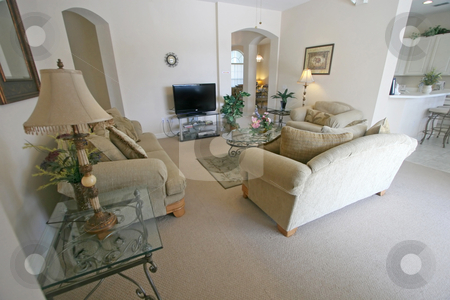 To use this stock image in your creative project, please select the size you need over to the right and click the "Add to Cart" button.
Your downloaded image will come with the Cutcaster watermark removed so don’t worry about the watermark you see on this page. Living Room stock photo, An Interior Living Room in a Home by Lucy Clark
