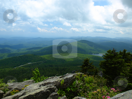 To use this stock image in your creative project, please select the size you need over to the right and click the "Add to Cart" button.
Your downloaded image will come with the Cutcaster watermark removed so don’t worry about the watermark you see on this page. Mountain vista stock photo, View seen from Grandfather Mountain Sate Park in North Carolina by Tim Markley