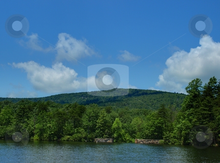 To use this stock image in your creative project, please select the size you need over to the right and click the "Add to Cart" button.
Your downloaded image will come with the Cutcaster watermark removed so don’t worry about the watermark you see on this page. Hanging Rock State Park stock photo, Lake view at Hanging Rock State Park in North Carolina by Tim Markley