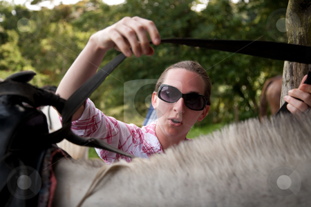 To use this stock image in your creative project, please select the size you need over to the right and click the "Add to Cart" button.
Your downloaded image will come with the Cutcaster watermark removed so don’t worry about the watermark you see on this page. Tourist in Costa Rica with Horse stock photo, Female tourist in Costa Rica with white horse by Scott Griessel