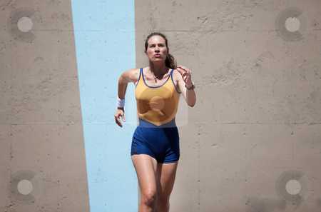 To use this stock image in your creative project, please select the size you need over to the right and click the "Add to Cart" button.
Your downloaded image will come with the Cutcaster watermark removed so don’t worry about the watermark you see on this page. Pretty, focused woman runs to keep in shape. stock photo, Determined woman runs for a healthy lifestyle. by Scott Griessel