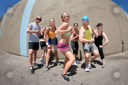 To use this stock image in your creative project, please select the size you need over to the right and click the "Add to Cart" button.
Your downloaded image will come with the Cutcaster watermark removed so don’t worry about the watermark you see on this page. Woman posing with fellow athletes stock photo, Pretty female runner poses with fellow athletes by Scott Griessel