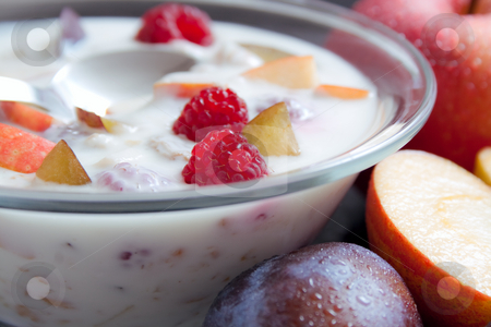 To use this stock image in your creative project, please select the size you need over to the right and click the "Add to Cart" button.
Your downloaded image will come with the Cutcaster watermark removed so don’t worry about the watermark you see on this page. Yogurt mixed with fruit pieces stock photo, Glass bowl filled with yogurt mixed with fruit pieces arranged with spoon and some fruits around by Miroslav Ivanov