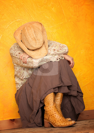 To use this stock image in your creative project, please select the size you need over to the right and click the "Add to Cart" button.
Your downloaded image will come with the Cutcaster watermark removed so don’t worry about the watermark you see on this page. Western woman with her head down stock photo, Pretty western woman in cowboy shirt and hat with her head down by Scott Griessel