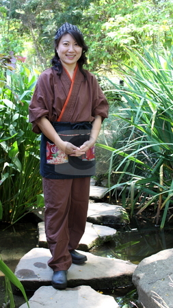 To use this stock image in your creative project, please select the size you need over to the right and click the "Add to Cart" button.
Your downloaded image will come with the Cutcaster watermark removed so don’t worry about the watermark you see on this page. Japanese women stock photo, Portrait of a Japanese woman with traditional clothing by Henrik Lehnerer