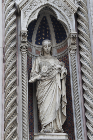 To use this stock image in your creative project, please select the size you need over to the right and click the "Add to Cart" button.
Your downloaded image will come with the Cutcaster watermark removed so don’t worry about the watermark you see on this page. Saint Reparata the Martyr stock photo, Saint Reparata the Martyr on the facade of Santa Maria del Fiore by Kevin Tietz