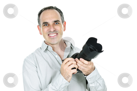 To use this stock image in your creative project, please select the size you need over to the right and click the "Add to Cart" button.
Your downloaded image will come with the Cutcaster watermark removed so don’t worry about the watermark you see on this page. Photographer with camera stock photo, Portrait of male photographer with camera isolated on white background by Elena Elisseeva