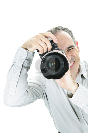 To use this stock image in your creative project, please select the size you need over to the right and click the "Add to Cart" button.
Your downloaded image will come with the Cutcaster watermark removed so don’t worry about the watermark you see on this page. Photographer with camera stock photo, Portrait of male photographer with camera isolated on white background by Elena Elisseeva